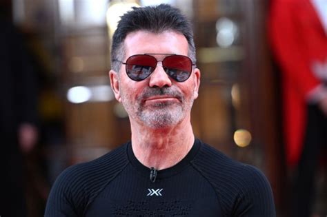 X Factor legend breaks down as 'nervous' Simon Cowell walks .